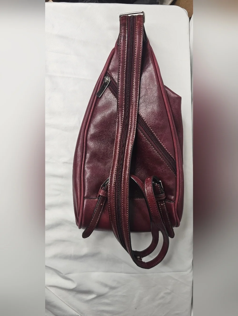 Rina Rich Burgundy Leather Teardrop Sling Backpack Convertible Zipper Strap Bag